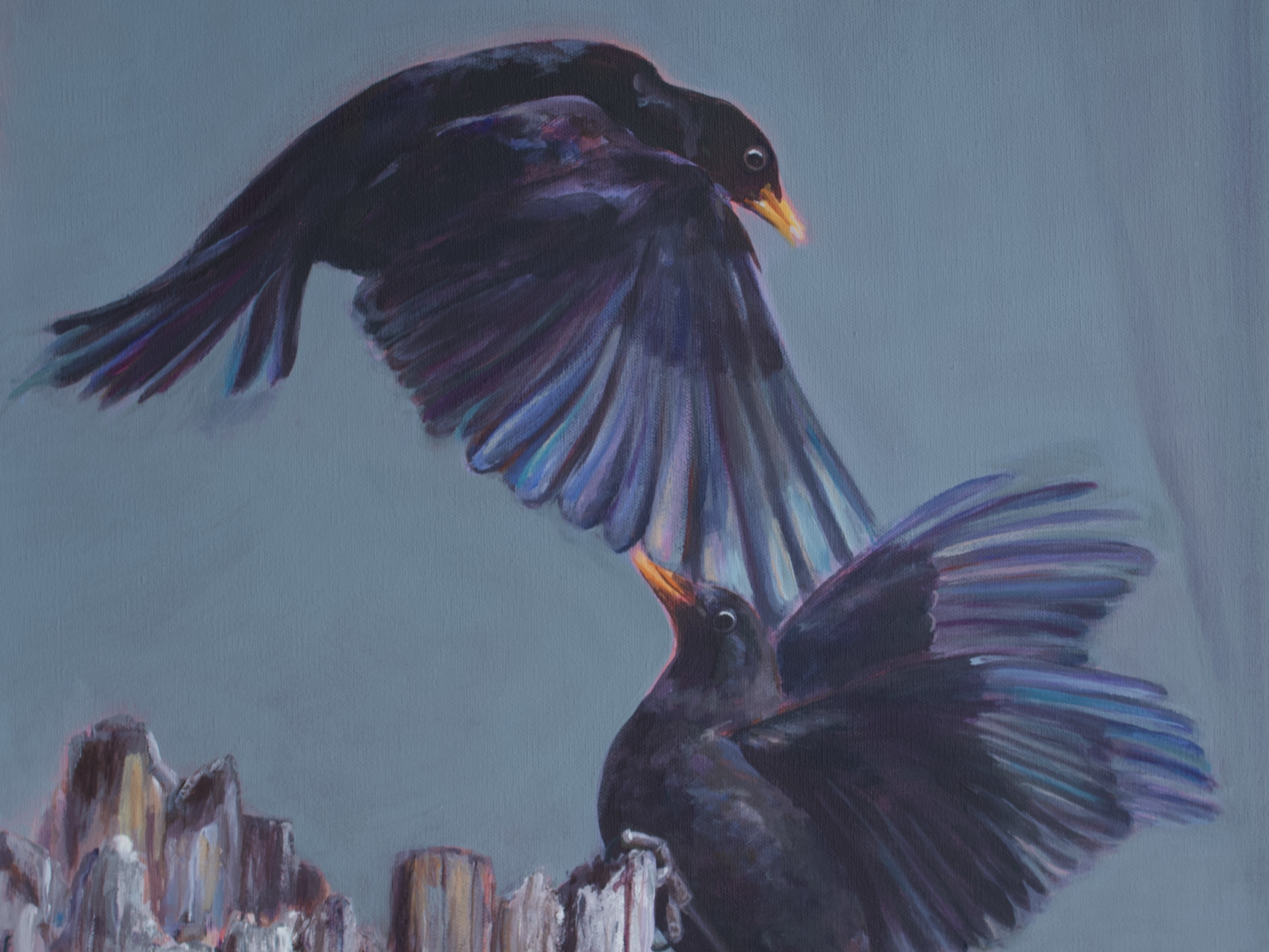 Predominantly blue painting of two blackbirds. One bird is perched on the top edge of a wooden structure. The other bird is in low flight just above the first bird.