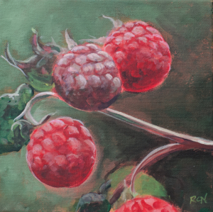 A stem with four glowing bright red raspberries on a multi-tone green background.